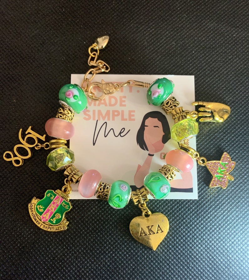 Gold Pink and Green Charm bracelet