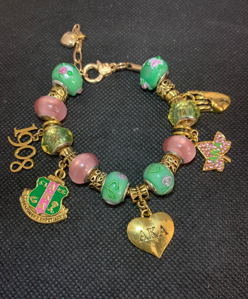 Gold Pink and Green Charm bracelet