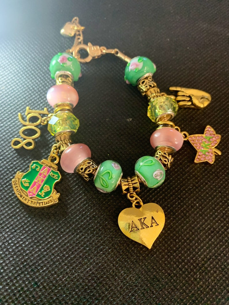 Gold Pink and Green Charm bracelet