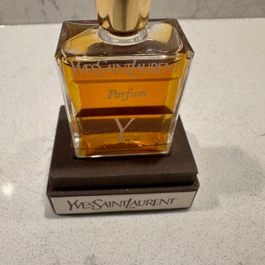 A Vintage Bottle of Yve Saint Laurent Perfume .5 fl oz in the original box image 3