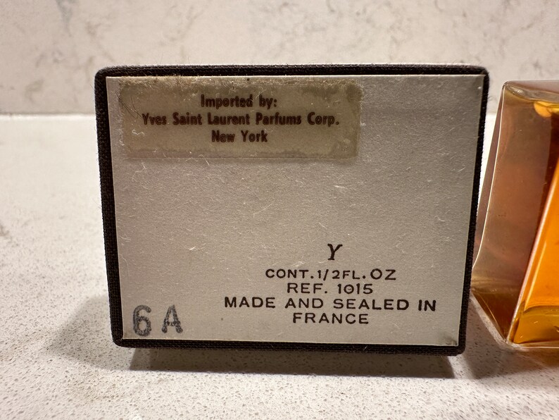 A Vintage Bottle of Yve Saint Laurent Perfume .5 fl oz in the original box image 4