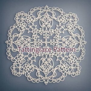 May include: A white crocheted doily with a delicate, intricate pattern. The doily is circular and has a centre design that resembles a flower. The text "Tattinglace Pattern" is written in the centre of the doily.