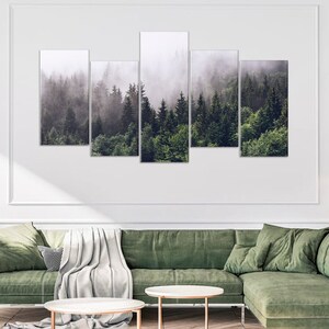 May include: A five-piece canvas print set featuring a misty forest scene with tall, green trees. The print set is perfect for adding a touch of nature to any room.