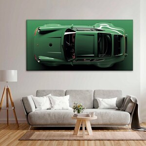 May include: A green sports car viewed from above. The car is on a green background.