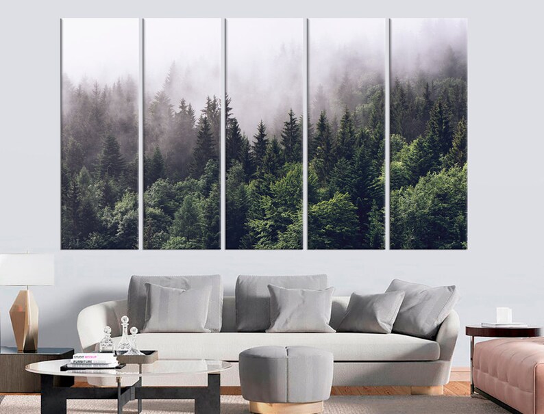 May include: A panoramic view of a lush green forest with tall trees and a thick layer of fog. The fog creates a mysterious and ethereal atmosphere, adding depth and dimension to the scene.
