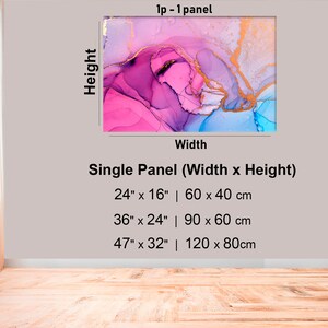 May include: Abstract art print with pink, blue, and gold colors. The print is available in three sizes: 24 inches by 16 inches, 36 inches by 24 inches, and 47 inches by 32 inches.