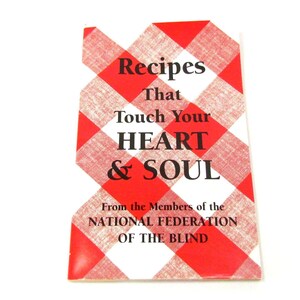 May include: A recipe booklet with a red and white checkered pattern. The cover reads "Recipes That Touch Your HEART & SOUL" and "From the Members of the NATIONAL FEDERATION OF THE BLIND" in black text.