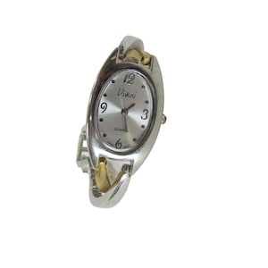 May include: Silver and gold-tone Vivani quartz watch with an oval face. The watch features a silver dial with gold-tone hands and hour markers. The watch band is a silver and gold-tone link bracelet.