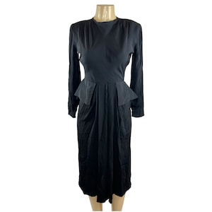 1940s Dress True Vintage Solid Black Peplum Knee Length Long Sleeve Shoulder Detailing Ben Lan Inc New York