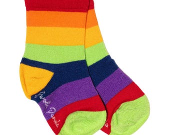 May include: A pair of rainbow striped ankle socks with a green heel and toe. The socks have the words "First Friends" written on the side.