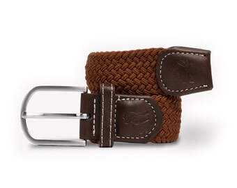 May include: A brown braided elastic belt with a silver buckle and a brown leather tab with a logo.