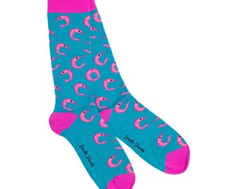 May include: A pair of blue socks with a pink shrimp pattern. The socks have a pink cuff and the words "Small Pond" are printed on the socks.