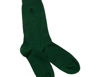 May include: A pair of dark green ribbed socks with a small embroidered logo on the top of one sock.