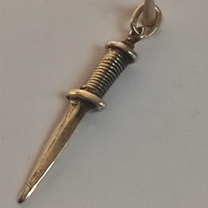 Bronze pendant, small dagger weapon