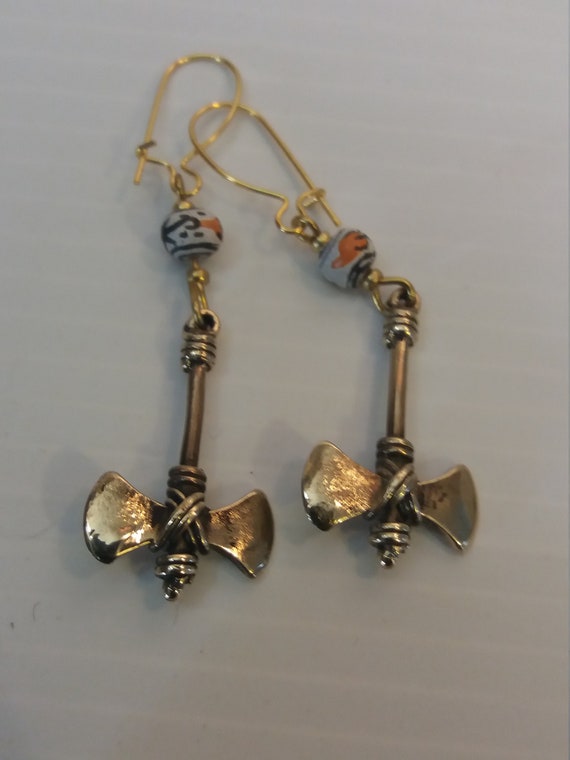 Bronze earring and ceramics double axe weapon - image 5