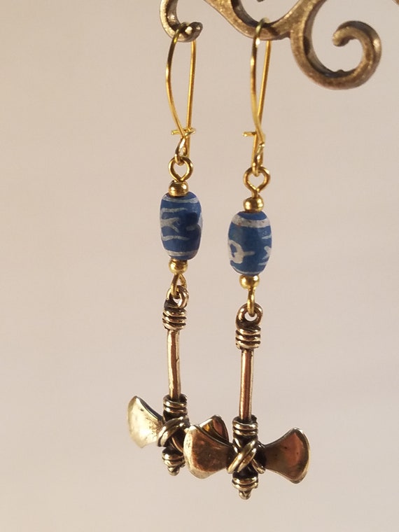 Bronze earring and ceramics double axe weapon - image 8