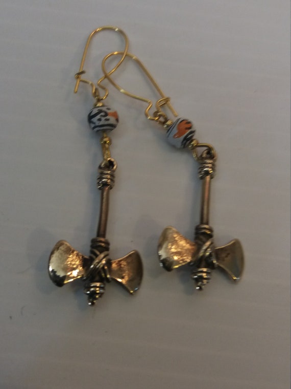 Bronze earring and ceramics double axe weapon - image 6