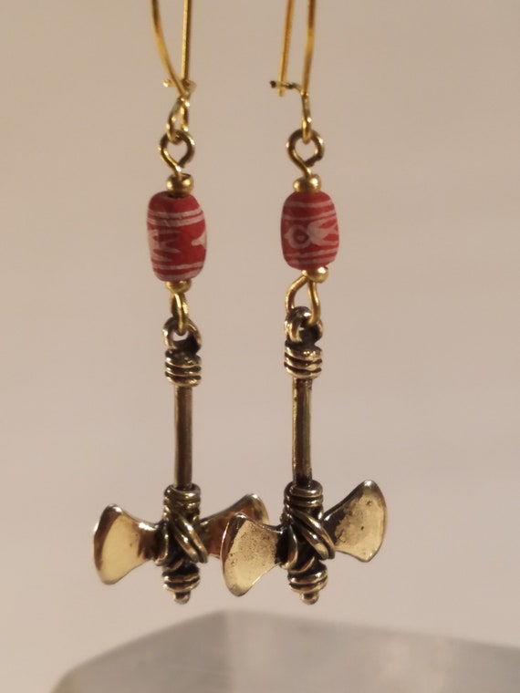 Bronze earring and ceramics double axe weapon - image 4