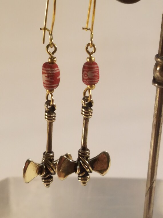 Bronze earring and ceramics double axe weapon - image 9