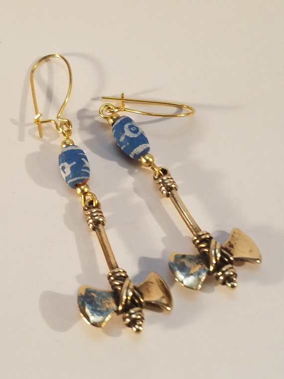 Bronze earring and ceramics double axe weapon - image 1