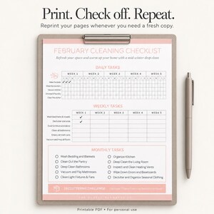Printed monthly cleaning checklist on a clipboard beside a pen, ready to complete by hand.
