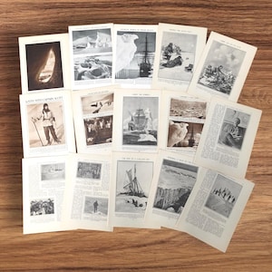 May include: A selection of antique black and white illustrations and text pages, possibly from a book or magazine. The images show scenes of exploration, ships, and landscapes, with text including "South with Captain Scott". The pages are arranged on a wooden surface.