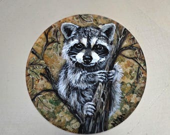 Hand Painted Racoon in a Tree Christmas Ornament: acrylic flat disk