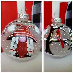 Hand painted Christmas ornament/Female Gnome with Red Cardinal in a winter scene/Gift box and ornament hanger included