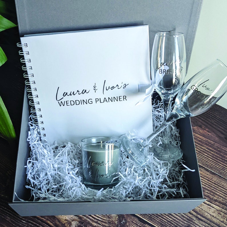 Engagement Gift with 2 champagne glasses, candle and wedding planner. Comes with Gift box and/or Gift Bag. Grey & Silver 
