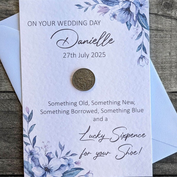 A  lucky wedding six pence mounted on an personalised A6 card for the bride on her wedding day to place in her shoe