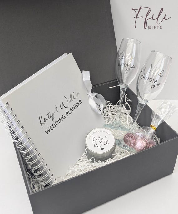 Engagement Gift Box – Personalised Champagne Glasses, Chocolates, Wedding Planner & Scented Candle. Comes with Gift box and/or Gift Bag.