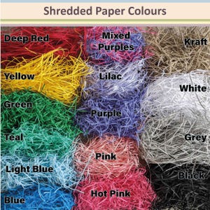 May include: An assortment of shredded paper in various colors, including deep red, yellow, green, teal, light blue, blue, mixed purples, lilac, purple, pink, hot pink, kraft, white, grey, and black. The text "Shredded Paper Colours" is at the top.