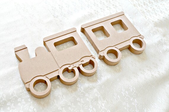 unpainted wooden trains