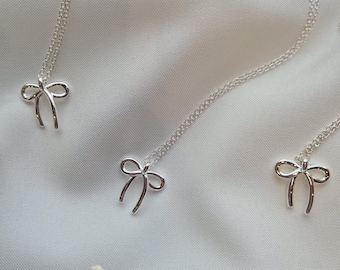 Dainty Silver Bow Necklace: Feminine Charm on Silver Plated Chain