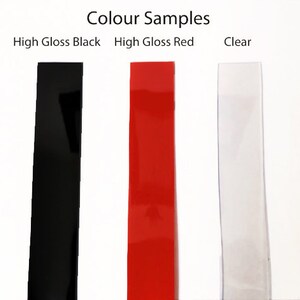 May include: Image of three color samples: high gloss black, high gloss red, and clear. The text "Colour Samples" is at the top. The black and red samples are rectangular and opaque. The clear sample is transparent.