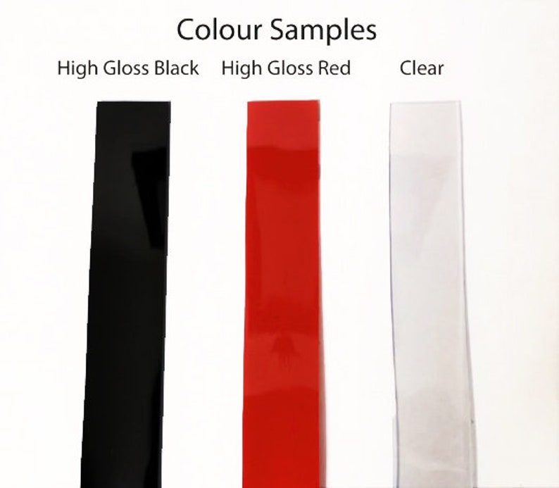 May include: Image of three color samples: high gloss black, high gloss red, and clear. The text "Colour Samples" is at the top. The black and red samples are rectangular and opaque. The clear sample is transparent.