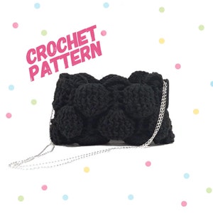 May include: Black crochet handbag with a silver chain strap. The bag has a textured, bubble-like design. CROCHET PATTERN is written in pink letters on the image.