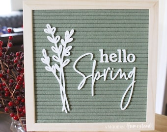 Hello Spring avec des feuilles en polices cursives et serif pour les tableaux à lettres et les tableaux en feutre