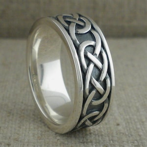 Sterling Silver Celtic Knot Wedding Ring with Oxidized Background 7.5 mm Wide Gift Boxed Sizes 5 -13 whole and half Keith Jack Jewelry
