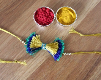 Silk Thread Rakhi with a FREE Roli Chawal packet| Raksha Bandhan Kundan  Rakhi Rakhri