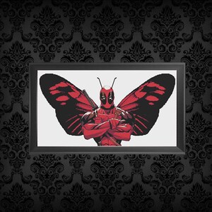 May include: A red and black superhero with butterfly wings, standing with arms crossed. The superhero is wearing a red and black suit with a mask.