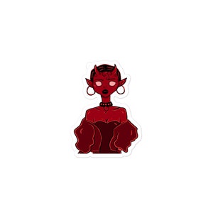 May include: A die-cut sticker featuring a stylized illustration of a red-skinned character with pointed ears, small horns, and pale eyes. The character wears a dark strapless top, a choker, and large hoop earrings, with a red jacket draped over shoulders.