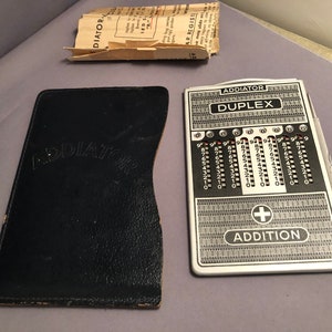 Vintage Slide Rule Addiator Addition Subtraction with metal Stylus and Case and instruction sheet.