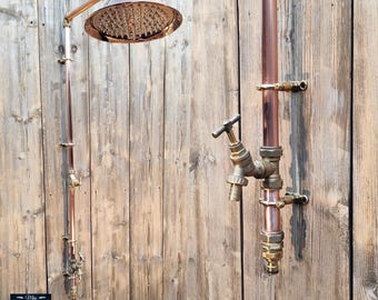 Ducha con manguera de cobre de alimentación única y grifo de jardín.