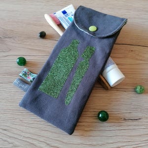 Glitzerndes grünes Zahnhygiene-Etui