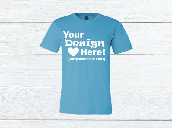 Turquoise Bella Canvas 3001 T-Shirt Mockup Wood Background