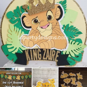 May include: A Lion King themed cake topper featuring a cartoon Simba wearing a gold crown. The topper includes a green and yellow jungle leaf background and a black banner with gold glitter that reads "King Zaire".
