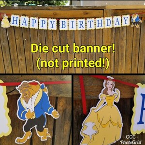 May include: A die-cut banner with the words "Happy Birthday" in blue letters on yellow squares. The banner is decorated with Belle and the Beast from Beauty and the Beast. The text "Die cut banner! (not printed!)" is written below the banner.