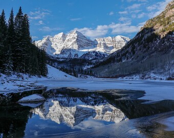 Maroon Bells reflecting in Maroon Lake of Colorado in winter photograph, landscape photography