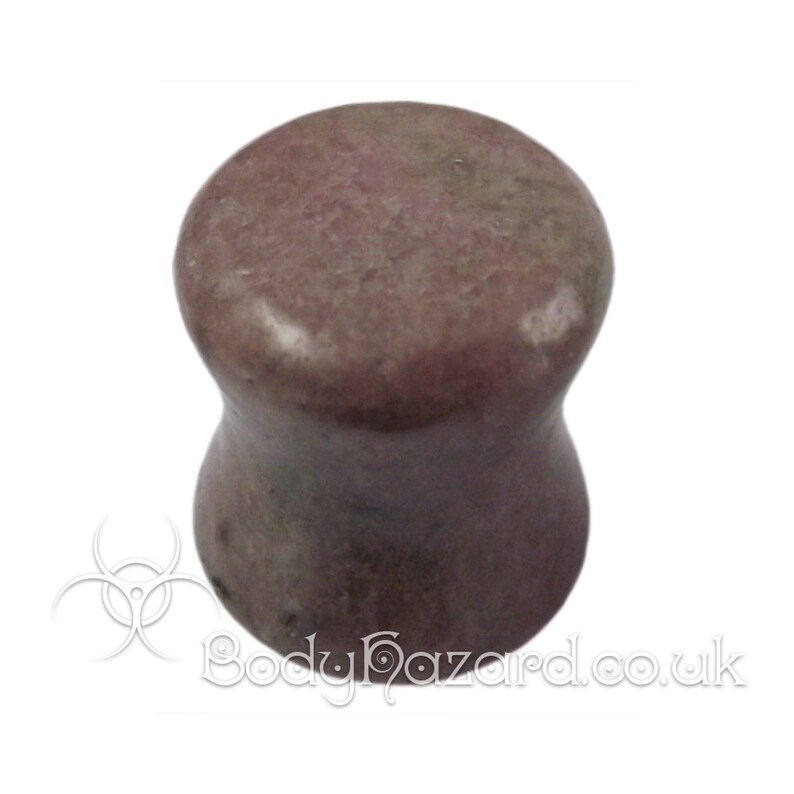 May include: A pair of pink and gray stone ear gauges. The gauges are flared and have a smooth, polished finish.